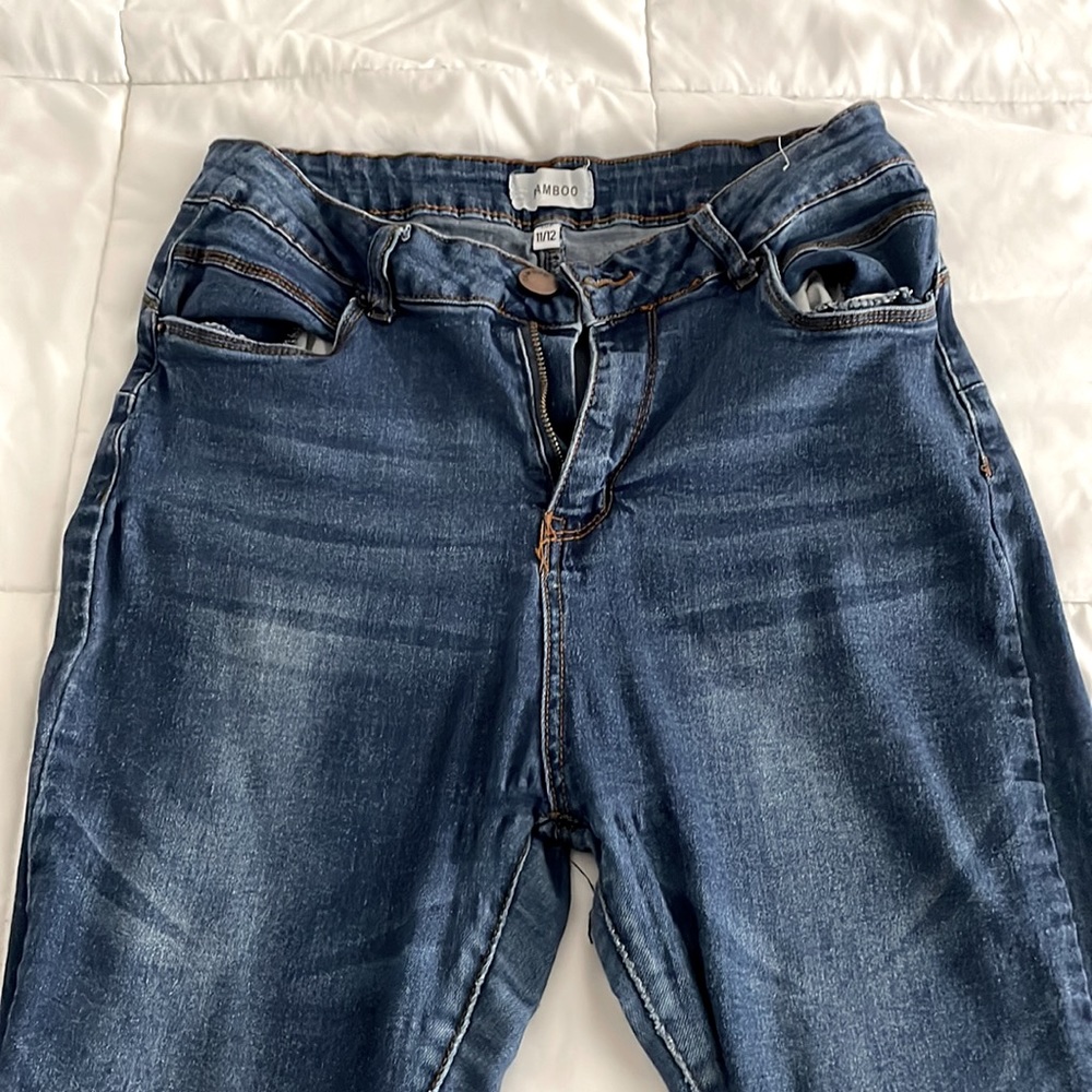 They’re a darkish blue color and they’re 11 - 12 in size